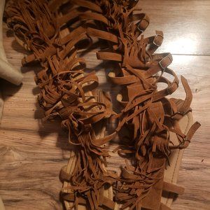 Knee high moccasin fringe sandals
